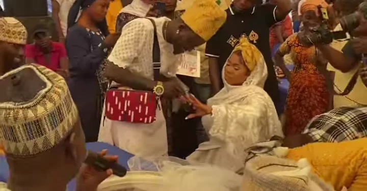 Singer Portable ‘weds’ lover at child’s naming ceremony