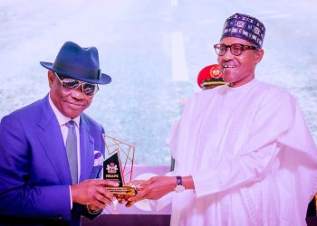 Pictorial: Buhari honours Wike, others with service award