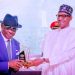 Pictorial: Buhari honours Wike, others with service award