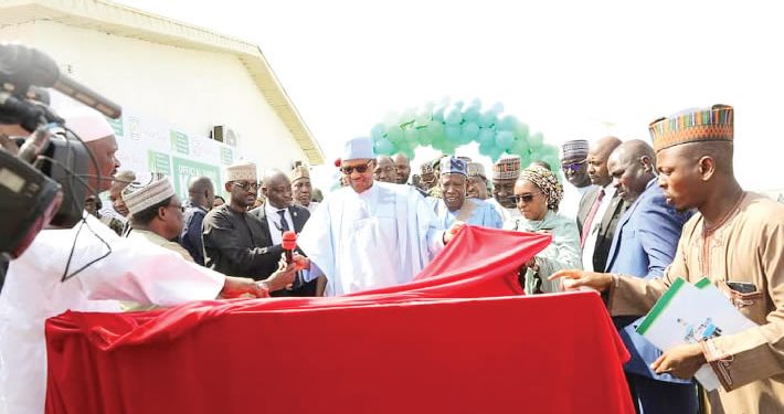 Buhari’s Kano visit: Protesting youths barricade roads, stone helicopter