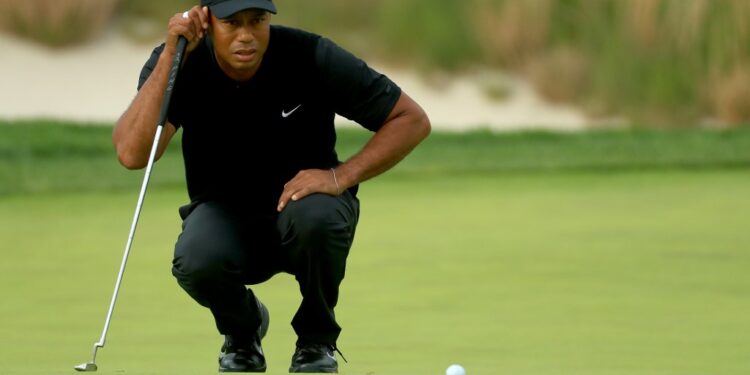 Woods to play weekend despite 74 at Riviera